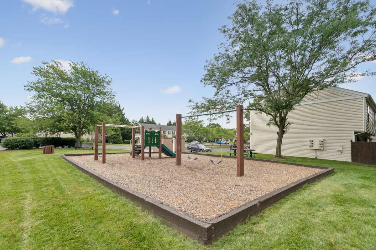 Pool with lounge chair at Preston Place Apartments & Townhomes in Winchester, Virginia 