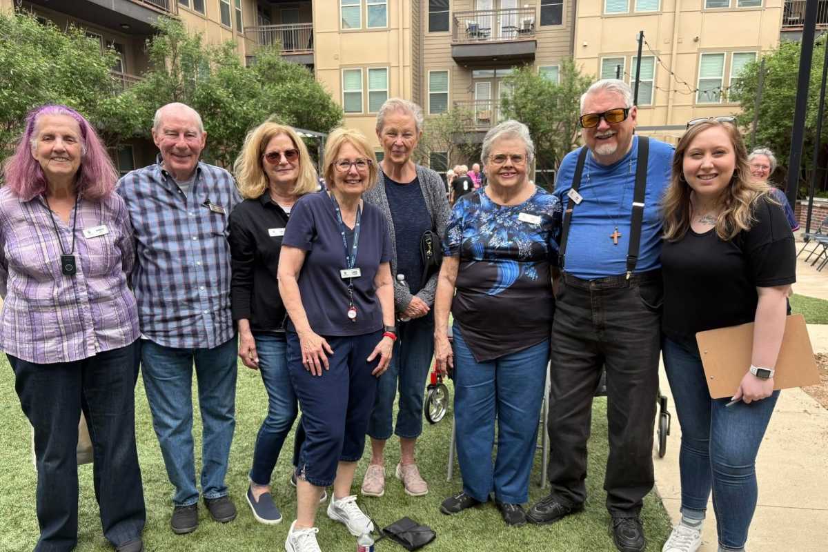 Residents relaxing at Watermere at Firewheel in Garland, Texas