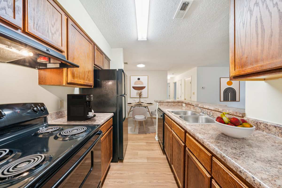 Kitchen with black appliances at Pilot House in Newport News, Virginia