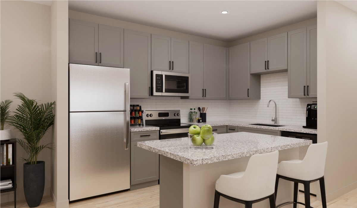 Blanco floor plan kitchen with grey cabinets at Remington Lake Apartments in Hamilton, Ohio