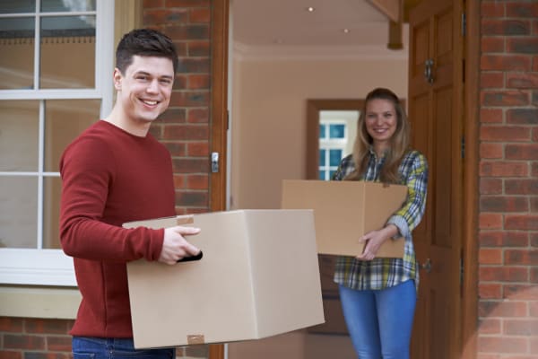 Couple moving boxes to Towne Storage - Arville in Las Vegas, Nevada
