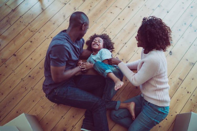 Family enjoying their apartment at Wedgewood Hills Apartment Homes in Harrisburg