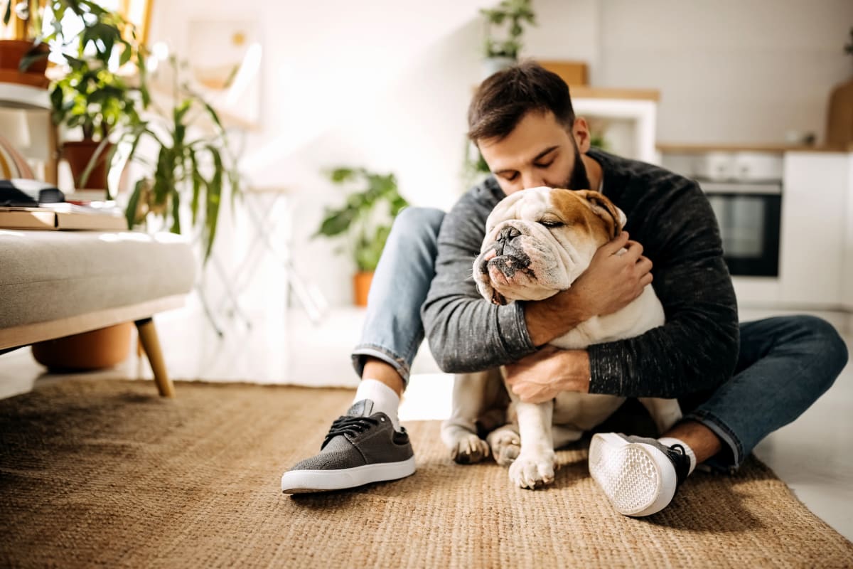 Resident giving his dog a hug at Parallel 36 at Jailette in Atlanta, Georgia