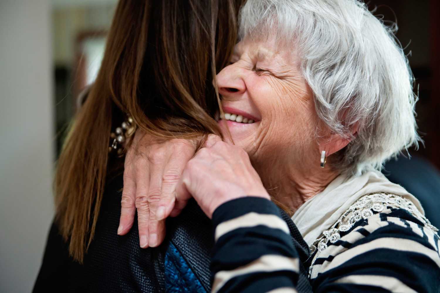 Resident and her daughter embracing at Location Finder - Page Load Testing in Bend, Oregon