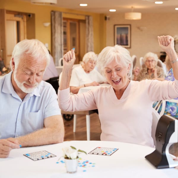 Residents playing games at Serra Highlands Senior Living in Daly City, California. 