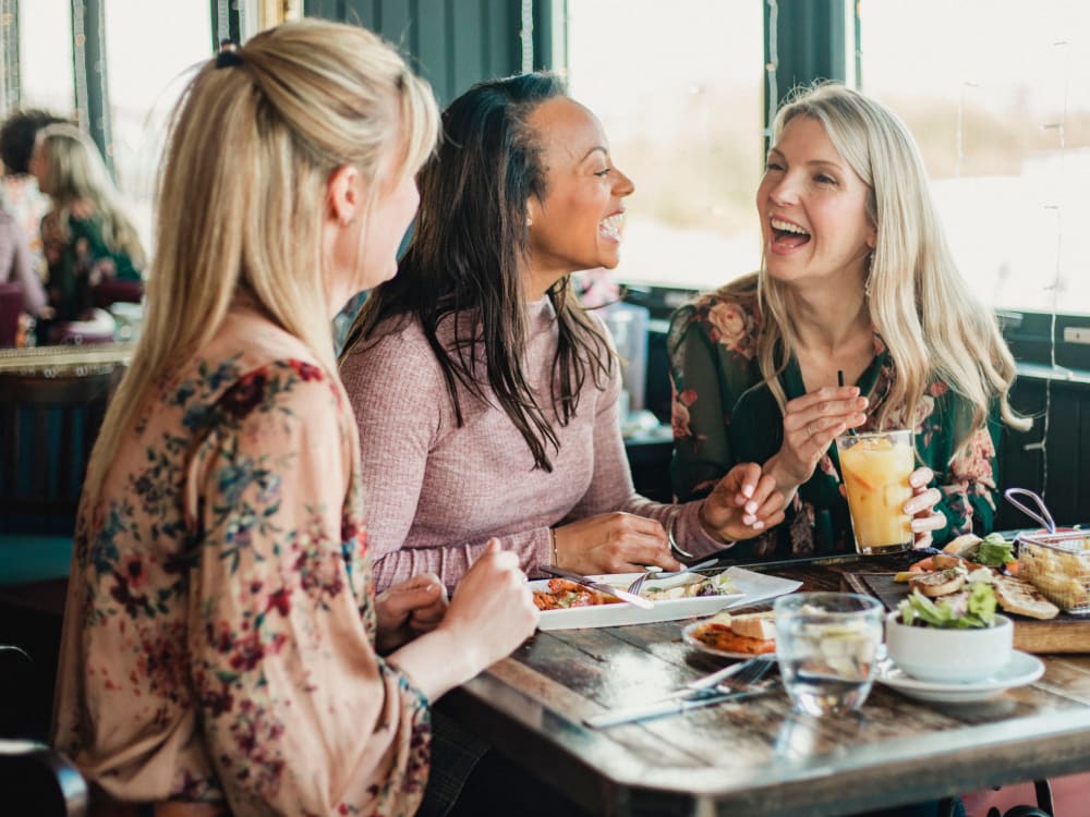 Friends out to eat near Montecito Apartments in Santa Clara, California