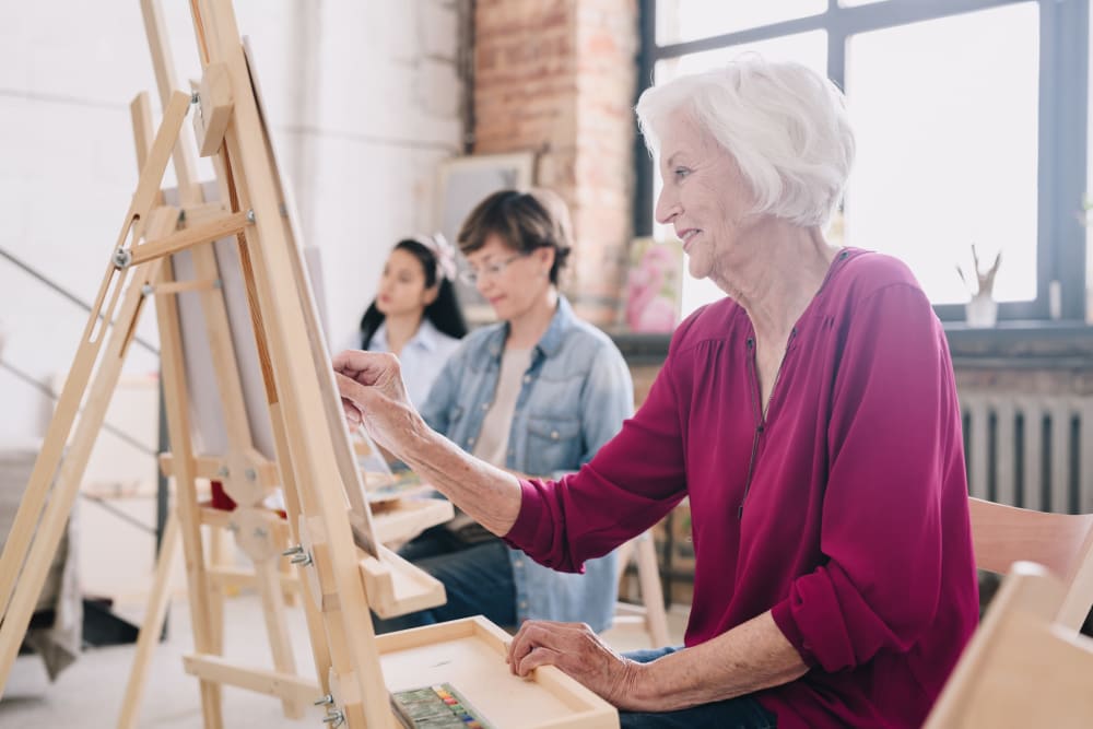 A resident painting at The Vista in Esquimalt, British Columbia.