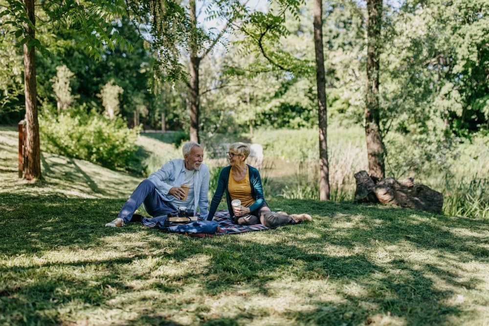 Resident couple habing a picnic at Village on the Park Steeplechase in Houston, Texas