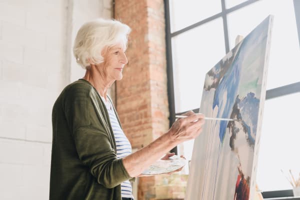 Ladies painting a picture at Clearwater at Glendora in Glendora, California