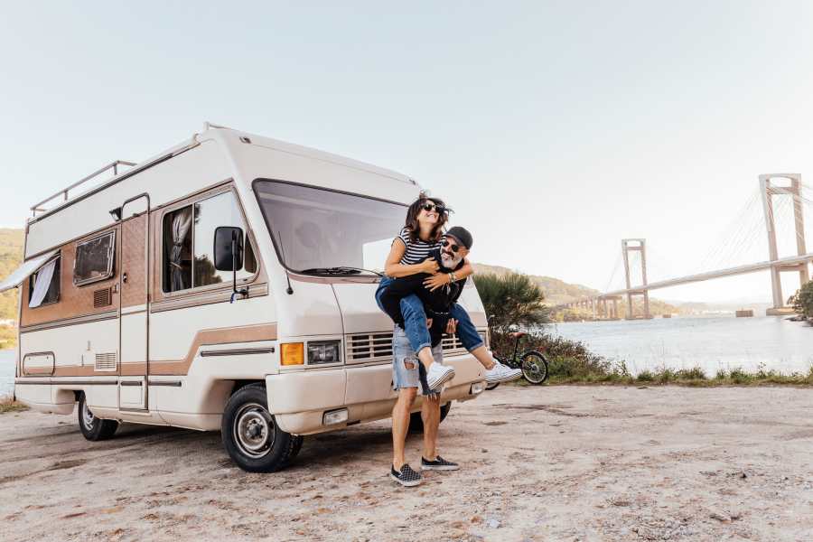 Couple standing in front of their camper at Railroad Avenue Self Storage, Suisun City, California