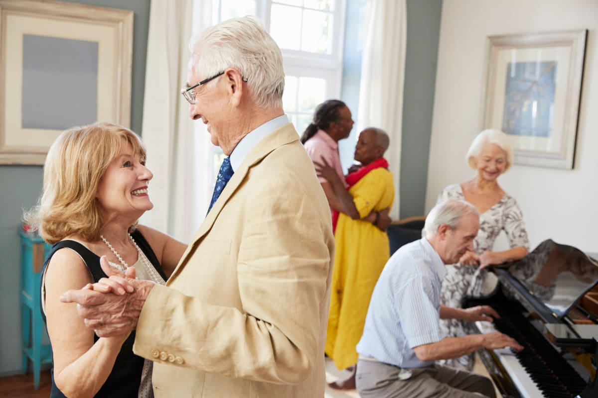 Residents dancing at The Claiborne at Shoe Creek in Central, Louisiana.