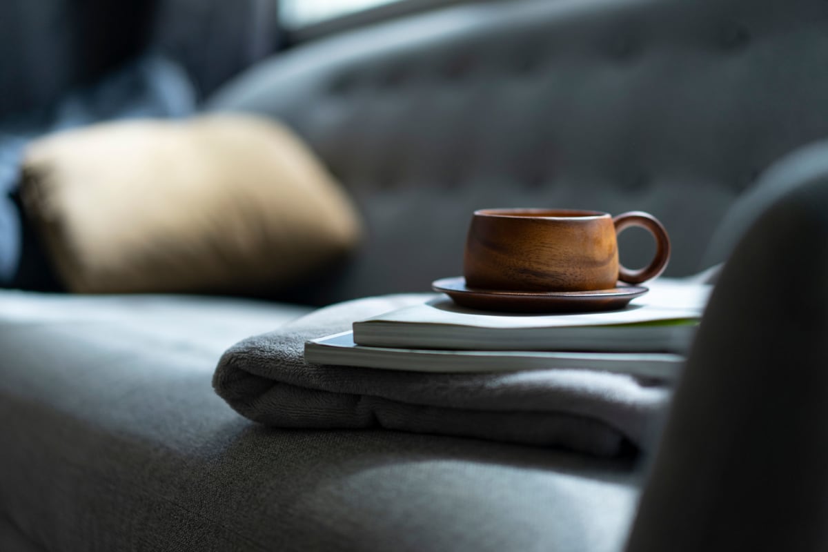 Sofa and coffee cup at Parallel 36 at Jailette in Atlanta, Georgia