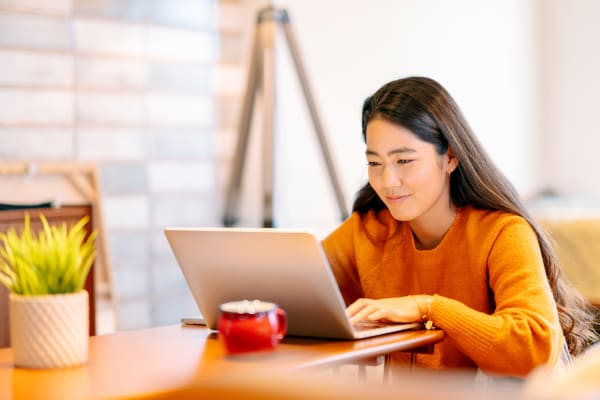 Resident doing online schooling at Solera at City Centre in Palm Beach Gardens, Florida