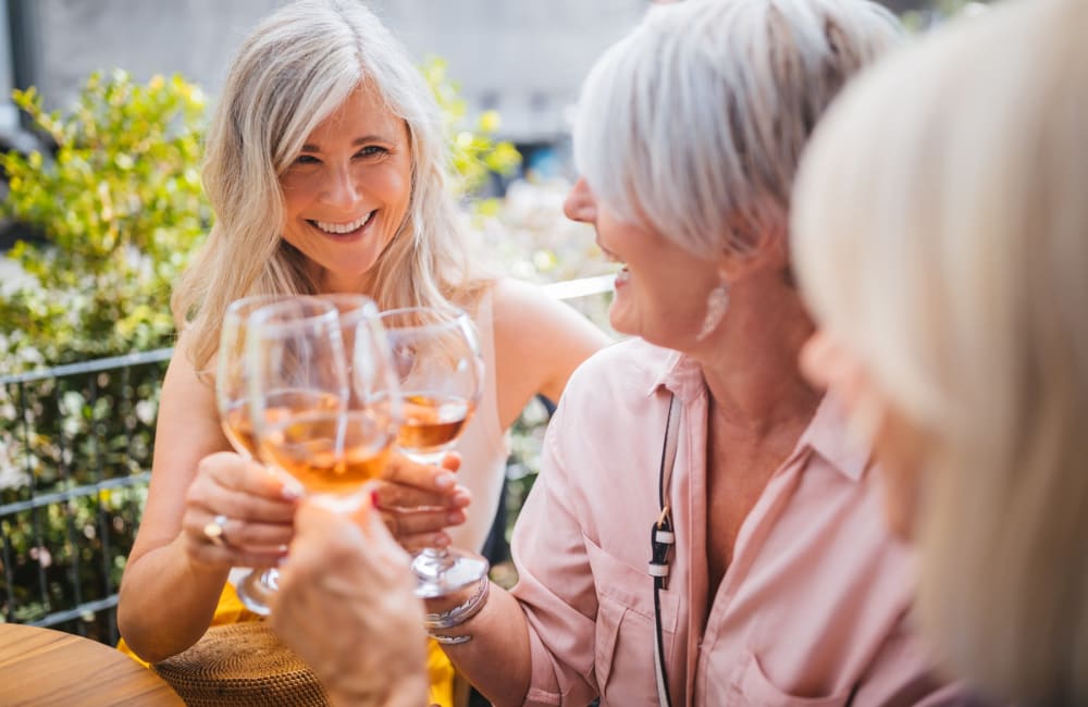 Residents enjoying a glass of wine at favorite local spot near Carden Place Apartment Homes in Mebane, North Carolina
