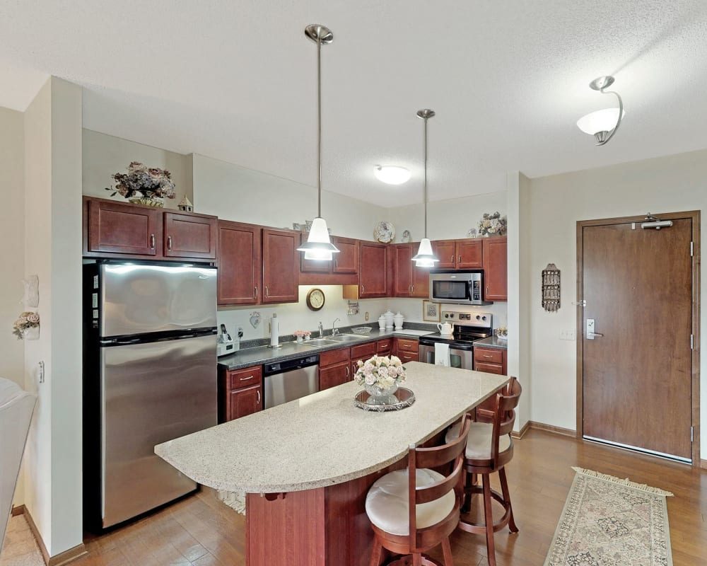 Kitchen with stainless-steel appliances at Oaks Glen Lake in Minnetonka. Minnesota