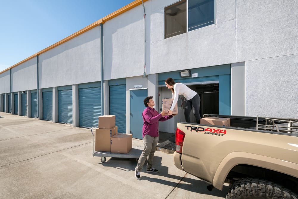 Couple unloading boxes at Castro Valley Storage LLC in Castro Valley, California