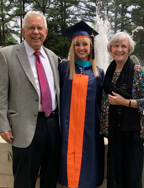 Residents and their granddaughter at her graduation near Inspired Living in Tampa, Florida.