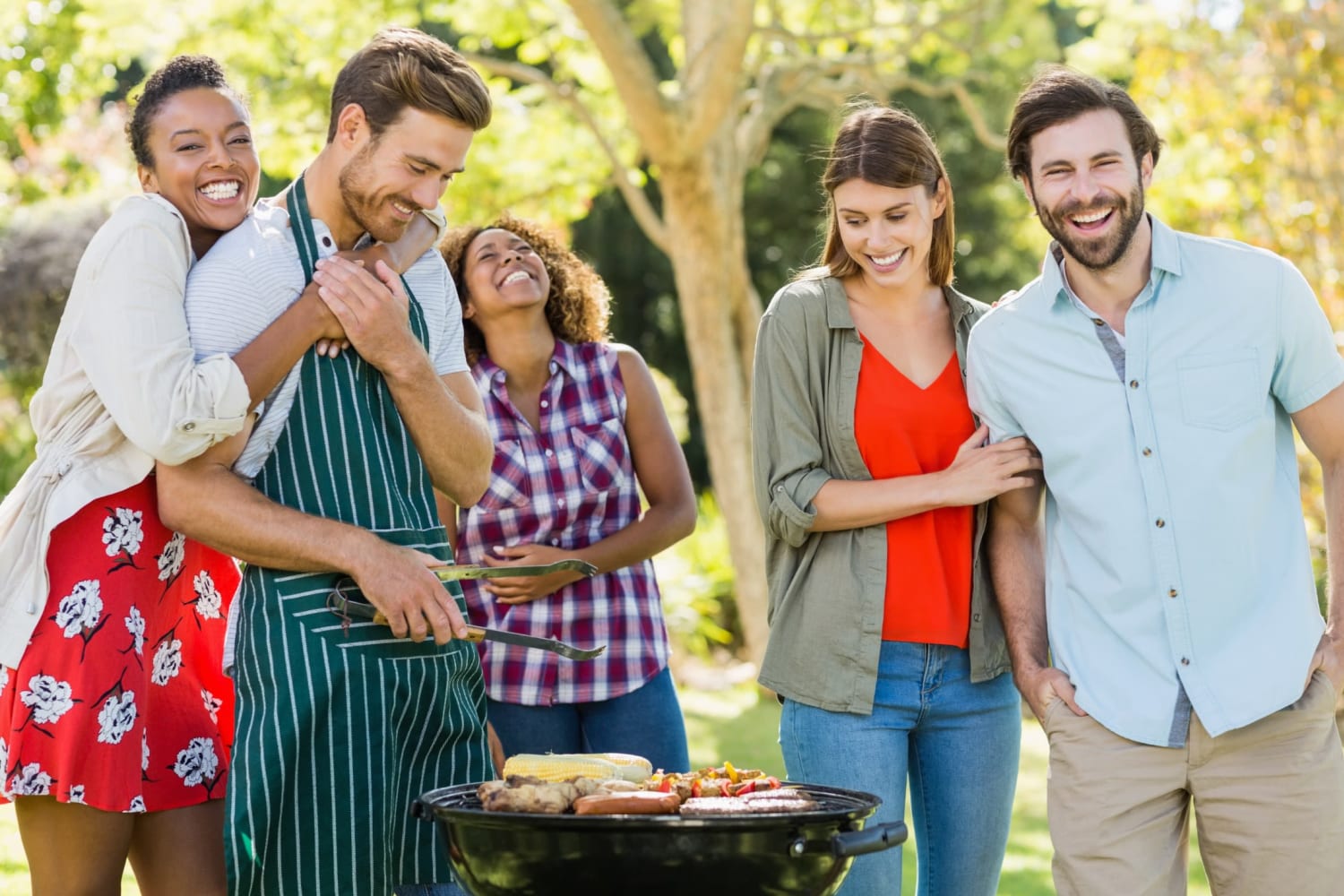Residents and friends grilling at Torrente Apartment Homes in Upper St Clair, Pennsylvania