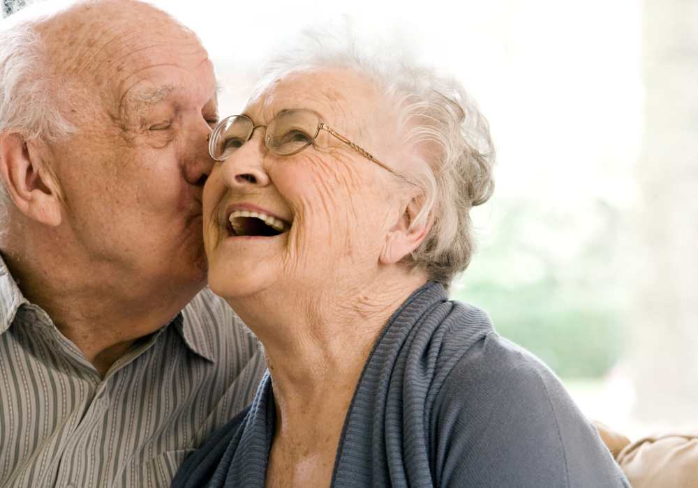 Resident couple embracing at Clearwater at South Bay in Torrance, California