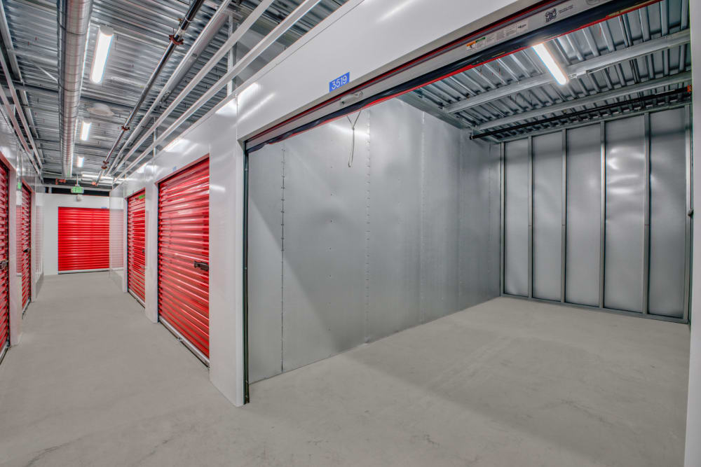 Ground floor storage units with open doors at Trojan Storage of Mokena in Mokena, Illinois
