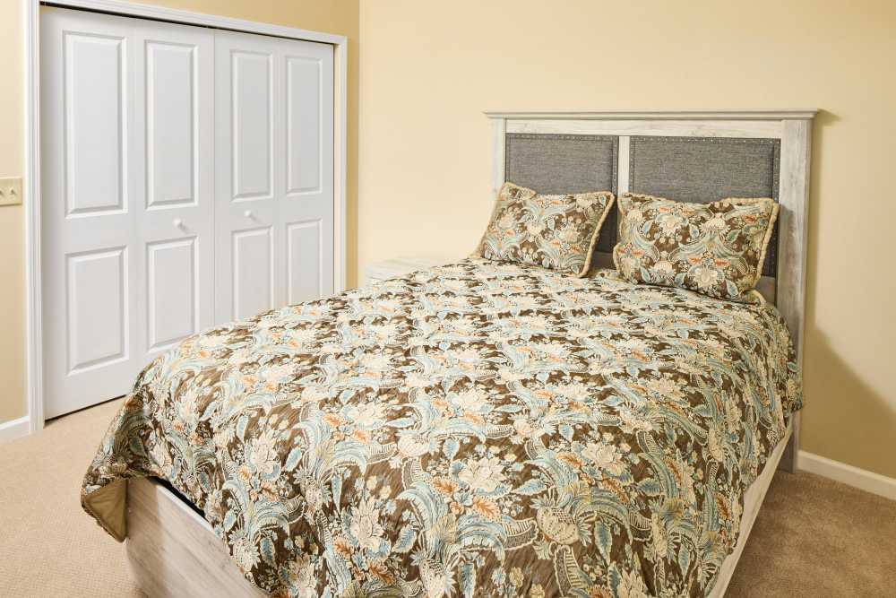 Senior apartment bedroom at Legacy Living Defiance in Defiance, Ohio
