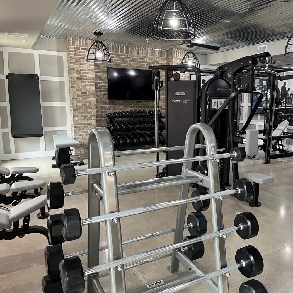 Gym with weights and machines at Edge 35 in Indianapolis, Indiana