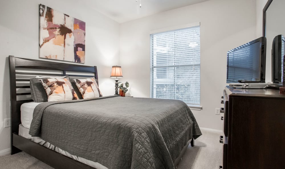 Spacious master bedroom in a model home at Riata Austin in Austin, Texas