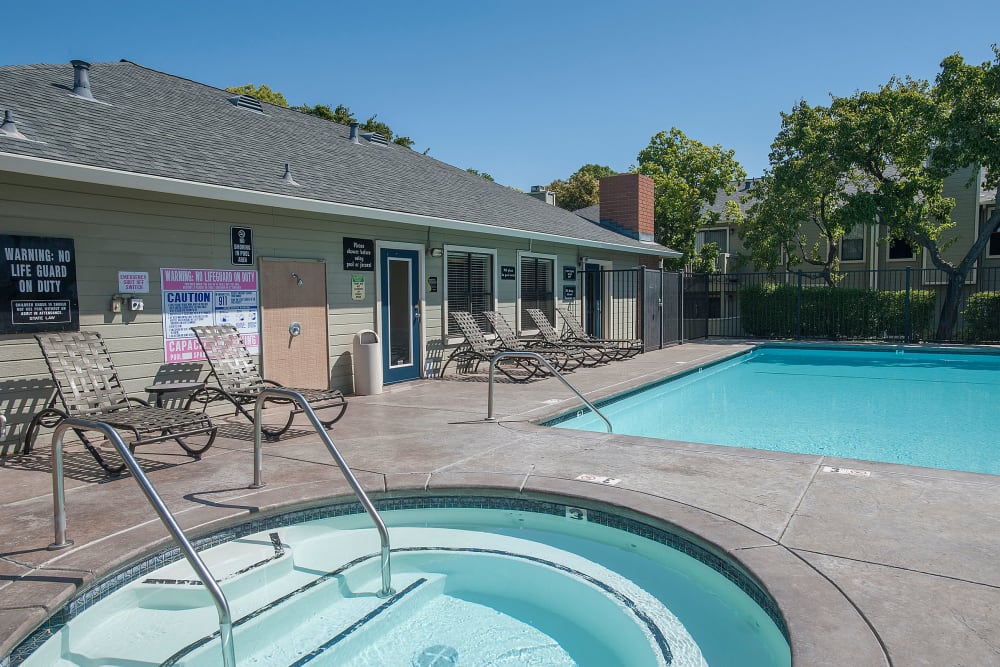 Resort-style spa and swimming pool at Sandpiper Village Apartment Homes in Vacaville, California