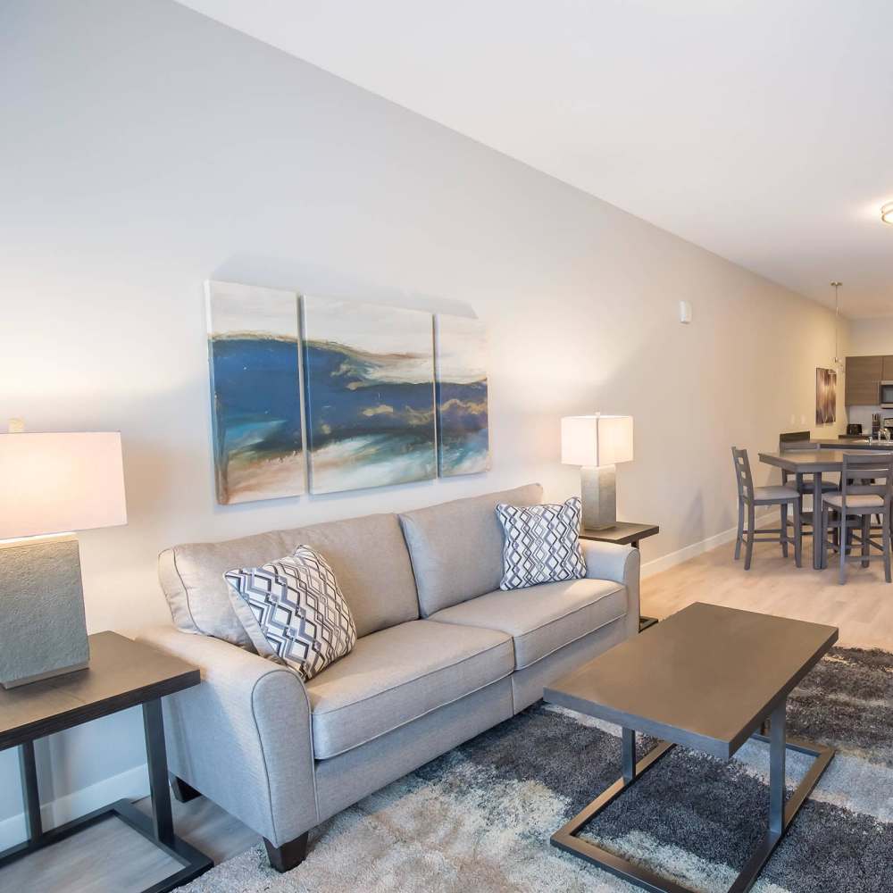 Living room with sofa and side lamps at Shiloh Commons in Billings, Montana