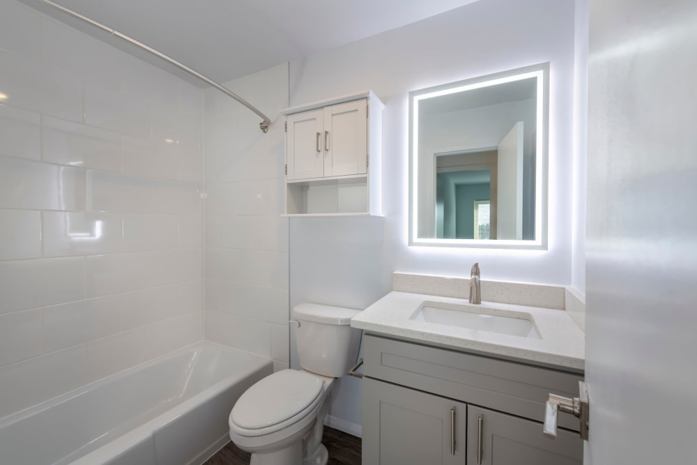 Model bathroom with quartz countertops at Ruxton Towers Apartments in Towson, Maryland