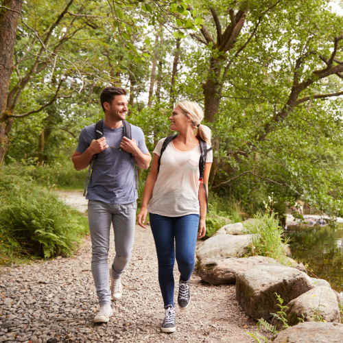 Residents walking along a trail near The Janson in Del Valle, Texas
