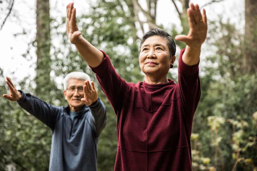 Residents practicing yoga at Mariposa at Scott and White Boulevard in Temple, Texas