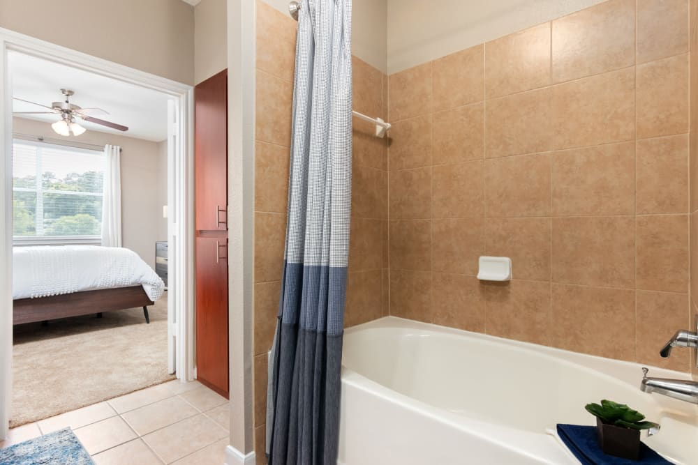 Bathroom with a bathtub at The Abbey on Lake Wyndemere in The Woodlands, Texas
