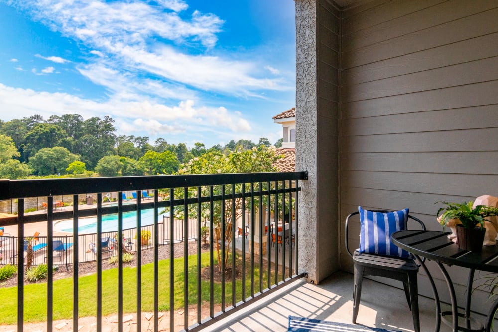 Enjoy apartments with a private balcony at The Abbey on Lake Wyndemere in The Woodlands, Texas