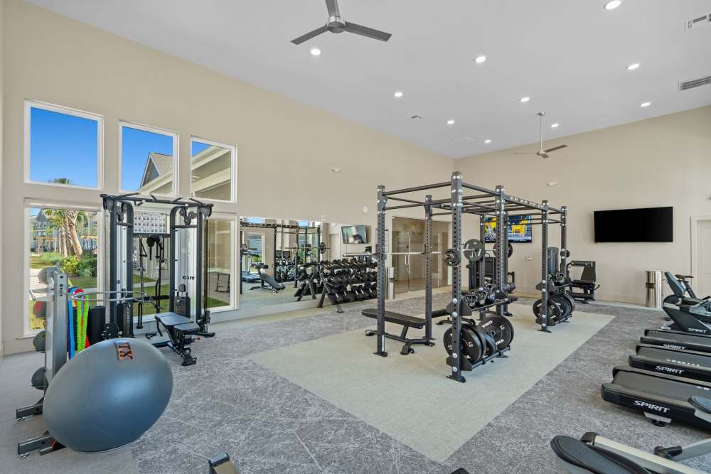 Resident working out in community fitness center at The Edison at Farrow Commons, North Myrtle Beach, South Carolina