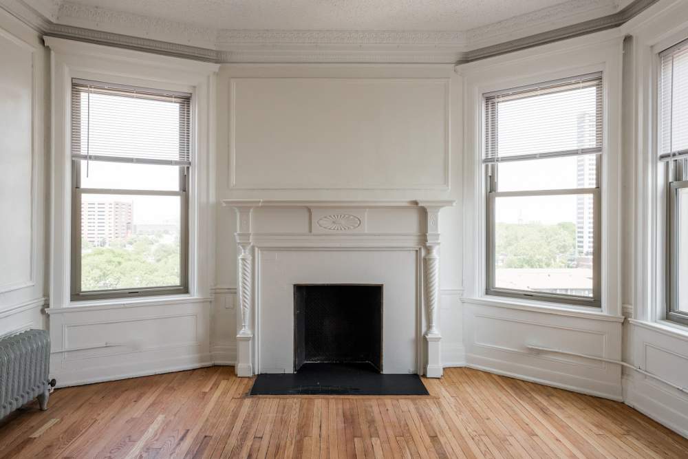 Spacious room with fireplace at Detroit Living in Detroit, Michigan