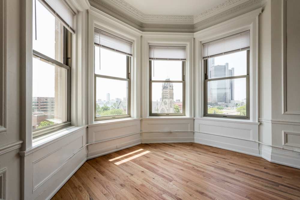 Spacious room featuring its windows at Detroit Living in Detroit, Michigan