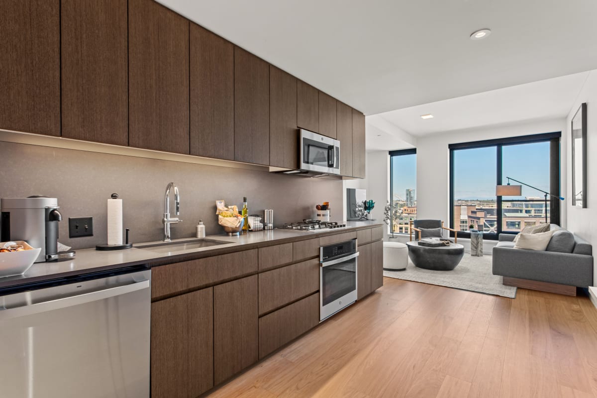Stainless-steel appliances in a kitchen at The Residences at 11W in Portland, Oregon