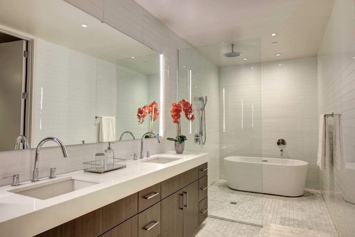 Modern finishes in an apartment bathroom at The Statler Residences, Dallas, Texas