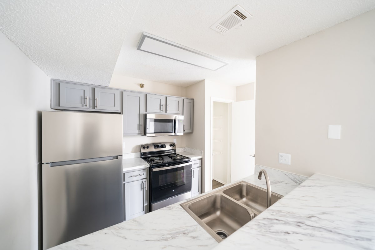 Apartment kitchen at Arlo of Olathe in Olathe, Kansas