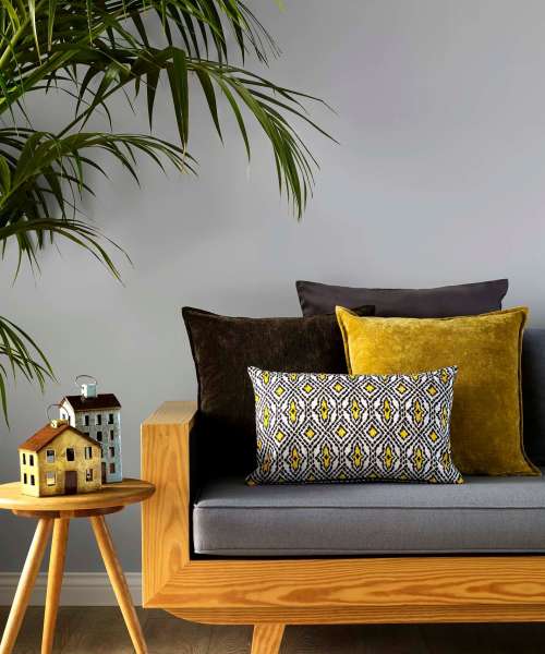 Couch and large plant at Gateway Plaza Apartments in Portland, Oregon