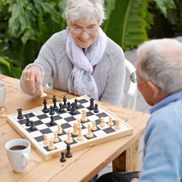 Residents playing chess at Pacifica Senior Living Rancho Penasquitos in San Diego, California