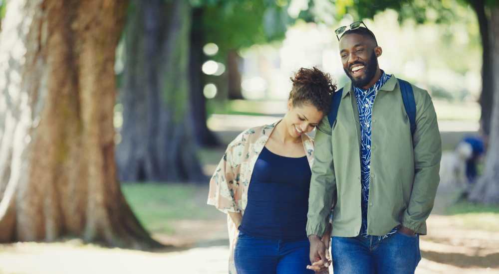 Happy residents walking near Manchester Commons in Pittsburgh, Pennsylvania