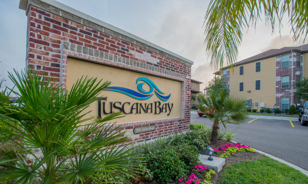 Entrance sign at Tuscana Bay Apartments in Corpus Christi, Texas
