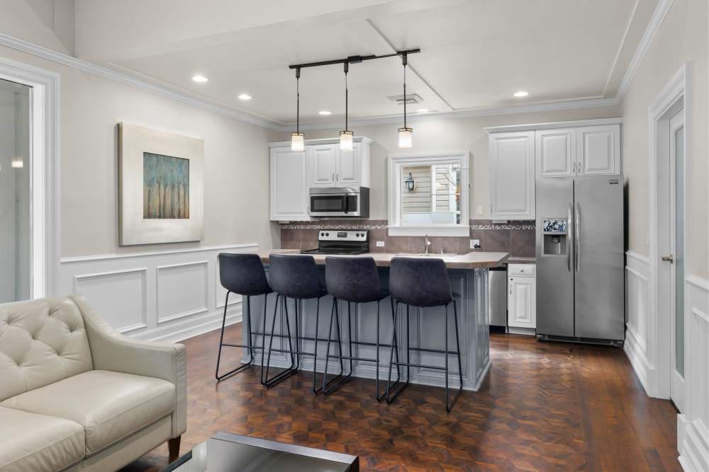Kitchen with counter seating at Gateway Park Apartments in Denver, Colorado