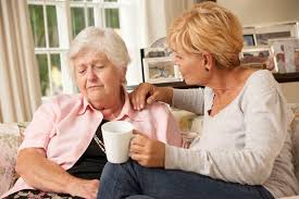 Female senior spending time with a family member. 