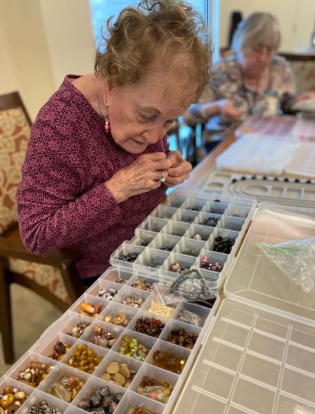 One Woodstock resident looks through beads for her next creation.