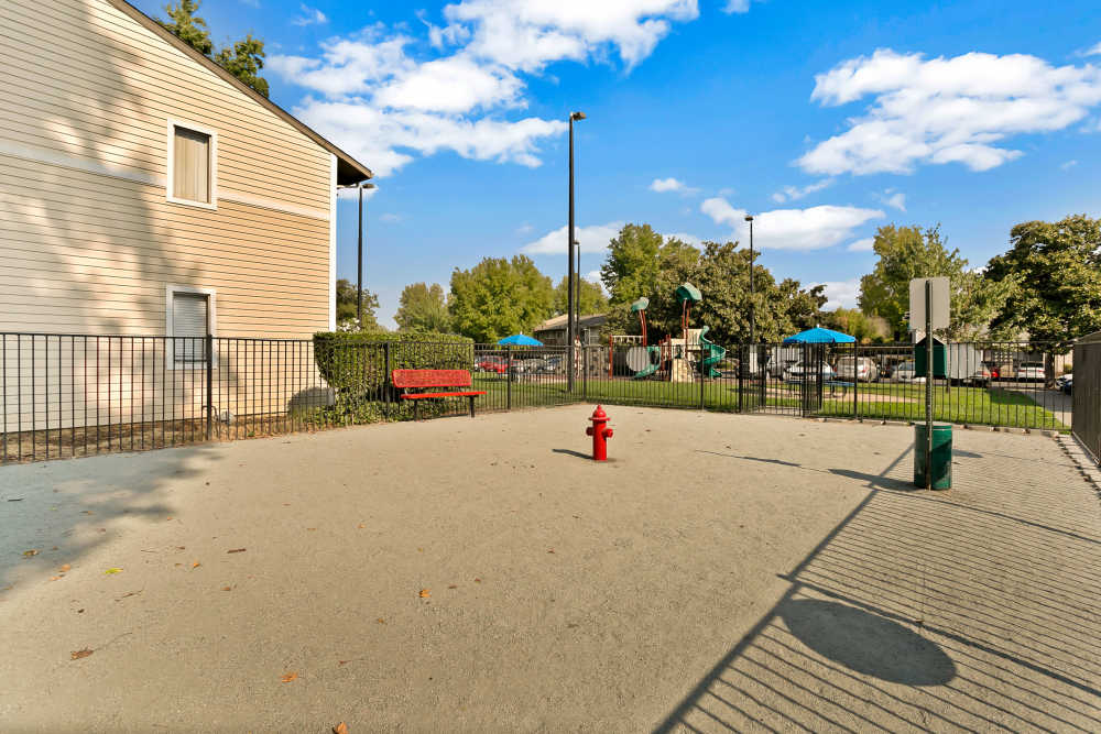 Dog park at The Woodlands Apartments in Sacramento, California