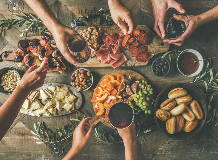 Charcuterie board with wine glasses at Westfield Condominium in Brockton, Massachusetts