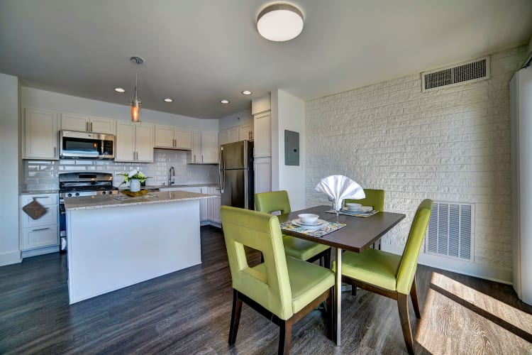 Open-concept living area with hardwood floors in a model home at Watergate Pointe in Annapolis, Maryland